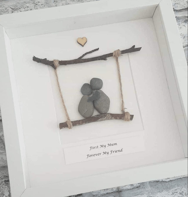 Mother & Daughter on a wooden swing, pebble picture